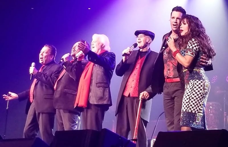 The original Osmond Brothers, from left, Alan, Jay, Merrill and Wayne perform Saturday, Oct. 13, 2018, at Blaisdell Arena in Honolulu with their sister Marie and Alan's son David.