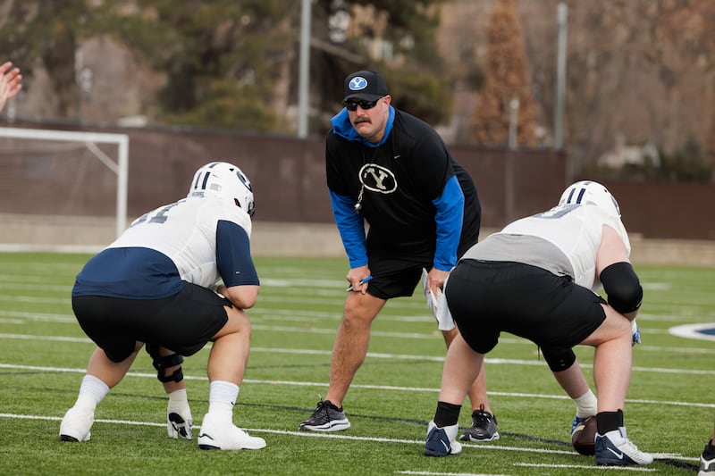 BYU offensive line coach in action during first day of spring drills in Provo, Feb. 29, 2024.