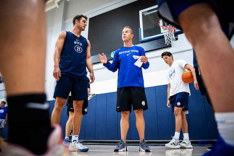 BYU basketball assistant coach Tim Fanning instructs players during workouts in the Marriott Center Annex in Provo.