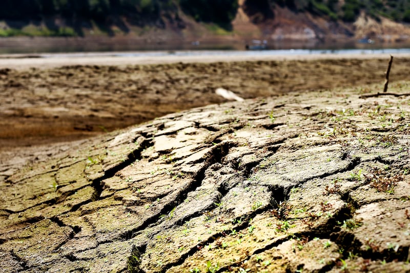 Cracked earth is seen in the waterbed of Jordanelle Reservoir near Kamas,