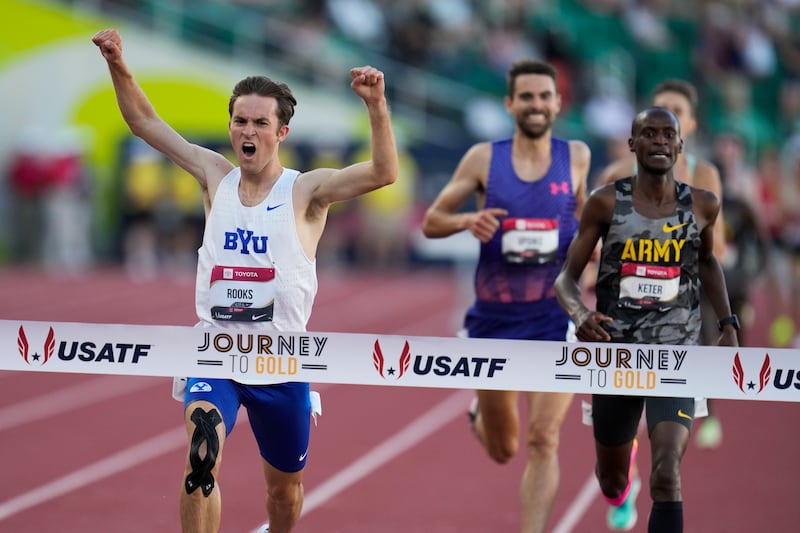 Kenneth Rooks crosses the finish line to win the men's 3000 meter steeplechase final during the U.S. track and field championships in Eugene, Ore., Saturday, July 8, 2023.