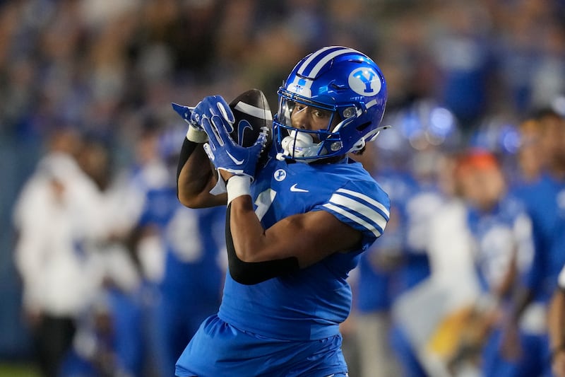 BYU's Keanu Hill catches a pass during game against Cincinnati Friday, Sept. 29, 2023, in Provo, Utah. The talented receiver has moved to tight end for the 2024 season.