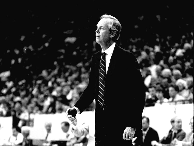 BYU basketball coach Frank Arnold coaches from the sidelines at the Marriott Center in Provo, Utah.