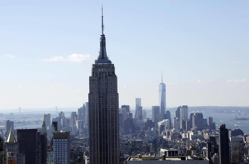 The Empire State Building and the Manhattan skyline are seen from the Rainbow Room, New York City"™s landmark restaurant atop 30 Rockefeller Plaza, in this Sunday, Oct. 5, 2014 file photo. Hundreds of people will take to the stairs at the Empire State Bui