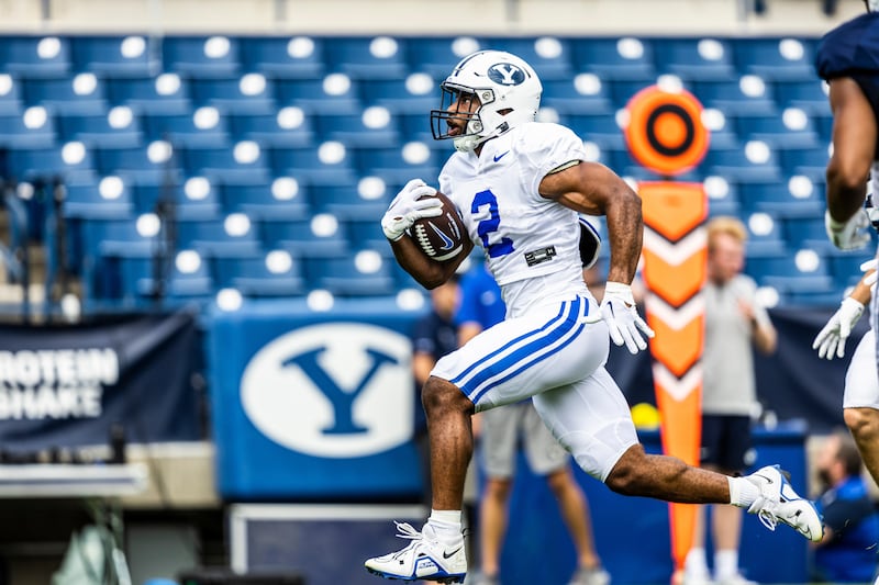 BYU running back Chris Brooks breaks free during a scrimmage at LaVell Edwards Stadium in Saturday, Aug. 13, 2022.